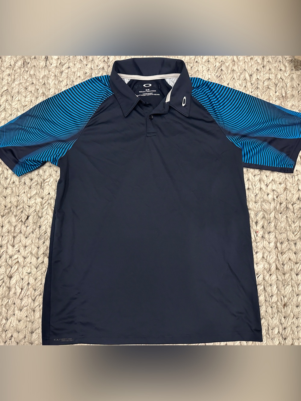 Oakley Navy Polo with Bright Blue Striped Sleeves